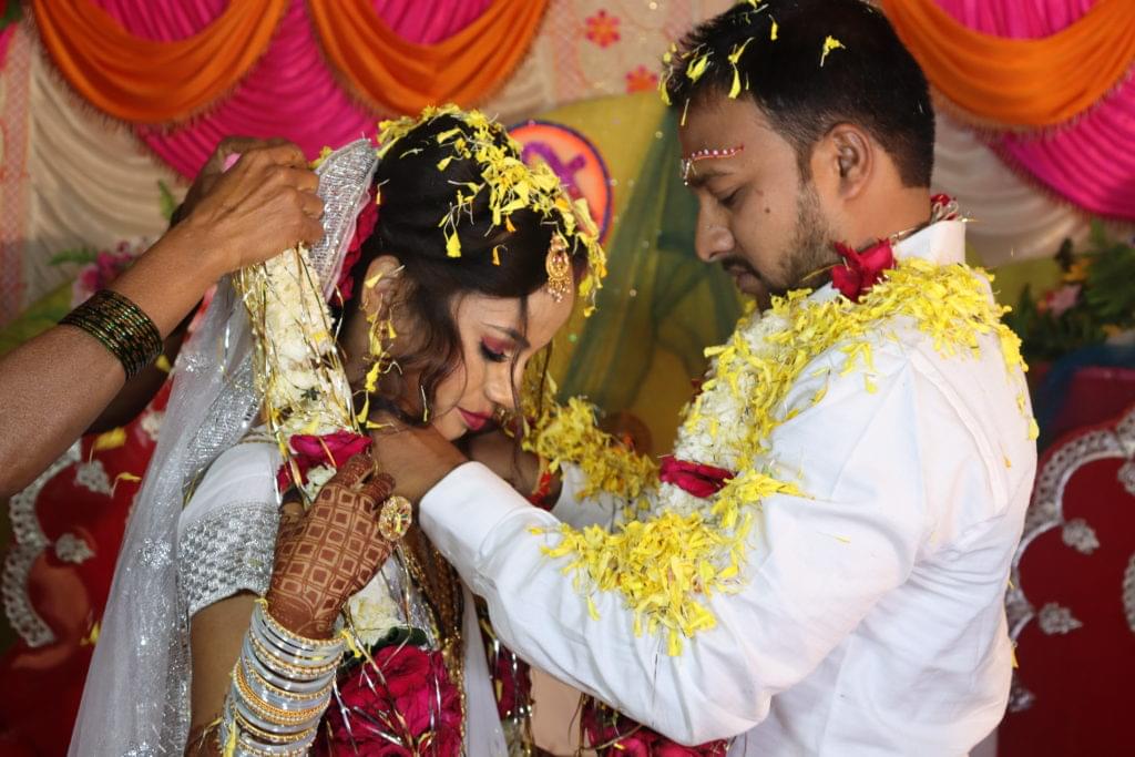 Candid pic of bride and groom getting married